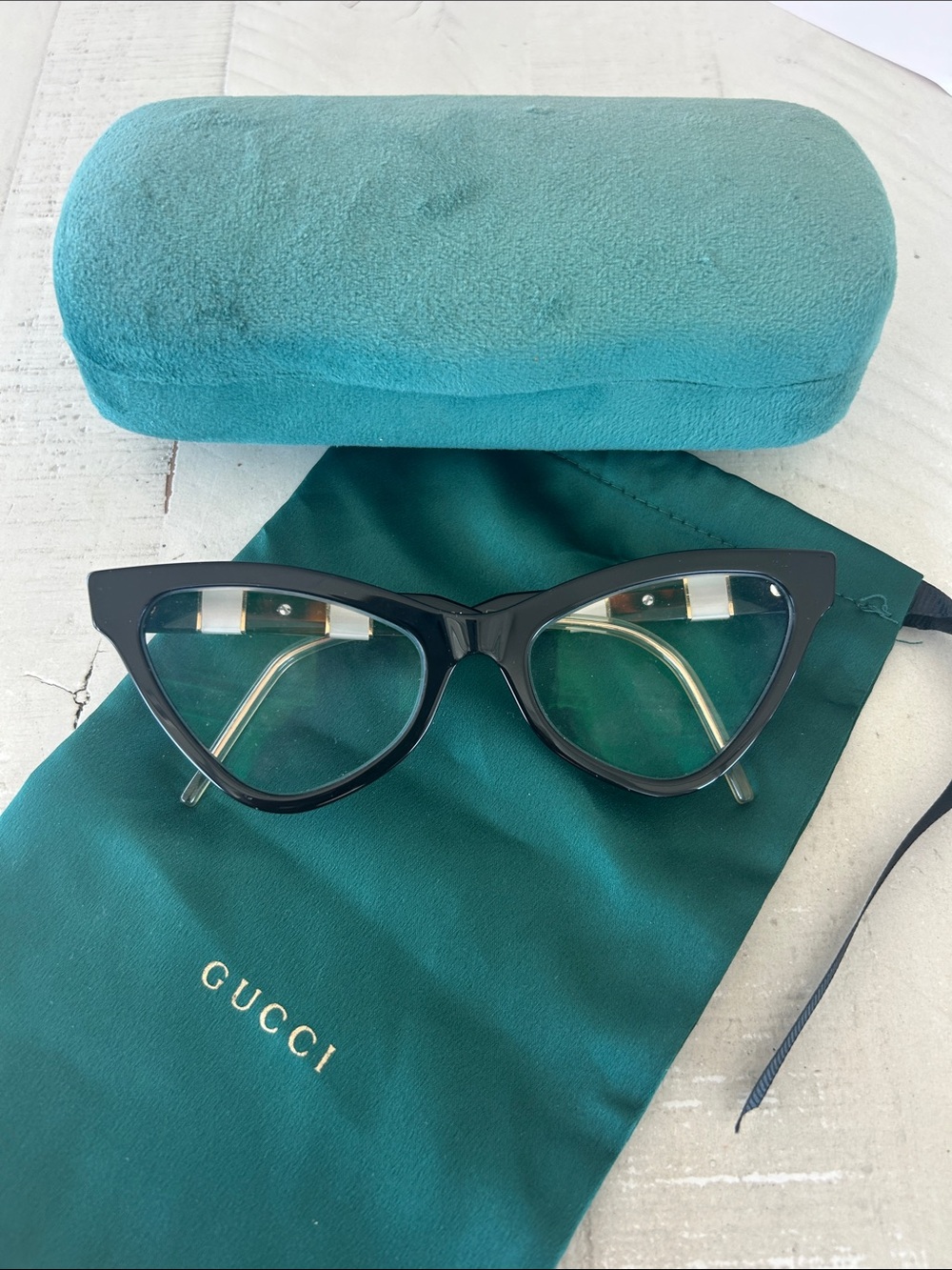 Gucci Black Cat-Eye Optical Frames with Gold Temples